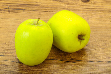 Two ripe green sweet apples