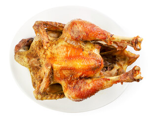 Baked chicken, turkey in a plate on a white background, isolated. Thanksgiving Day