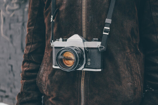 Fototapeta vintage camera around neck