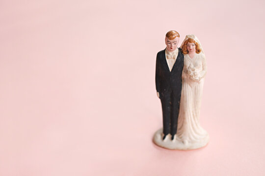 Fototapeta Vintage wedding couple cake topper decoration