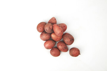 a pile of potatoes isolated on white background flat lay. Harvesting concept