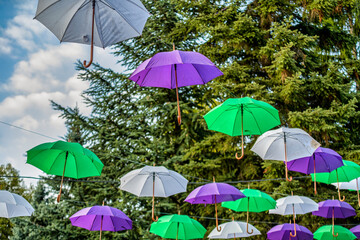 Fototapeta na wymiar umbrellas in the city sky