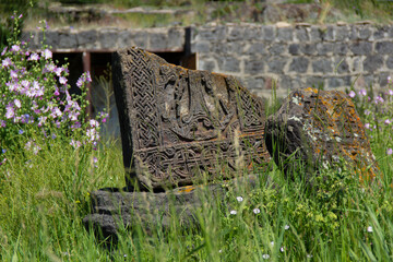 Fototapeta na wymiar Broken medieval Christian tombstone khachkar