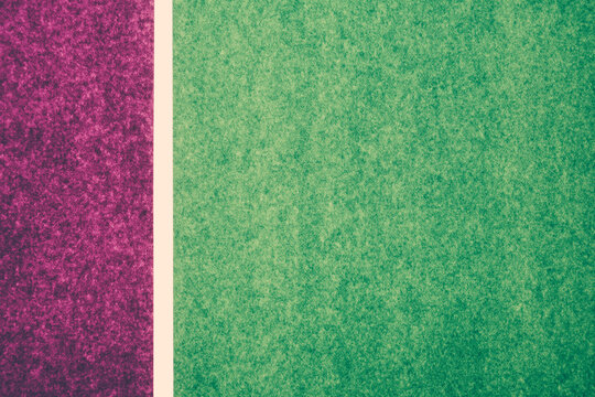 Detail of purple and green sheets of construction paper