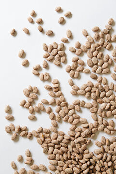 Organic lima beans on white backdrop
