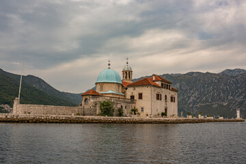 Our Lady of the Rocks (Gospa od Skrpjela) is island and church near Perast in the Bay of Kotor, Montenegro. One of the two islets off the coast of Perast