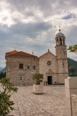 Our Lady of the Rocks (Gospa od Skrpjela) is island and church near Perast in the Bay of Kotor, Montenegro. One of the two islets off the coast of Perast