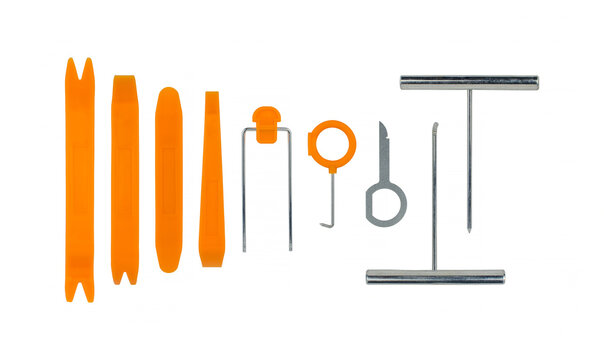Trim and removal pry tools set isolated for removing plastic car console and door panel inside the car