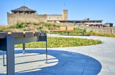 Bench in the park and castle in the background 
