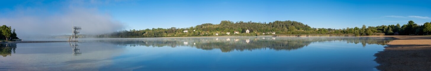 Clairvaux-Les-Lacs, France - 09 01 2020: Reflections on the big lake - La Raillette