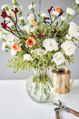 Series, step by step installation of flowers in a vase. Flowers bunch, set for home. Fresh cut flowers for decoration home. European floral shop. Delivery fresh cut flower.
