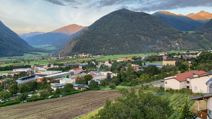 Fototapeta na wymiar Morning panoramic view of tyrolean valley with village Mels