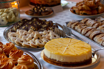 Wedding dessert table with homemade cookies and cheesecake