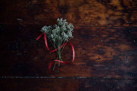 baby's breath on wooden table