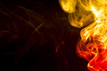 Colored smoke on black background