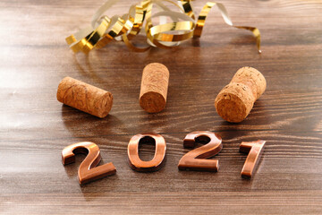 Fototapeta na wymiar Happy New Year. The number 2021 on brown background.