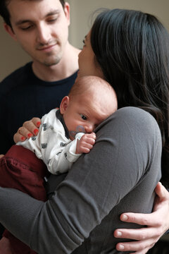 Young couple with newborn son.