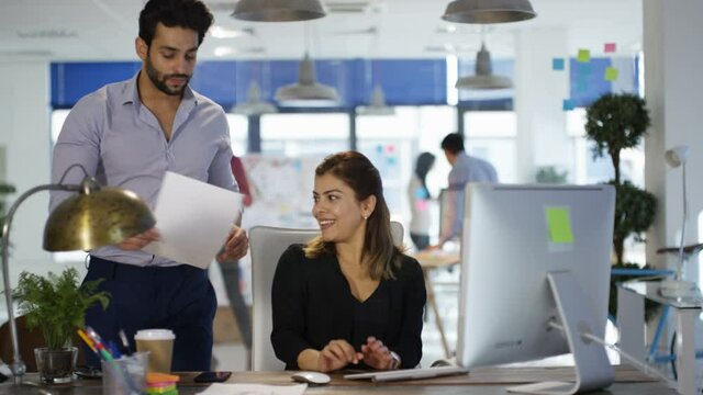 Modern Worker in Office with Colleagues