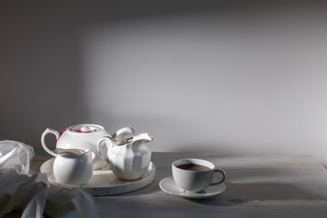 white ceramic tea set on the table