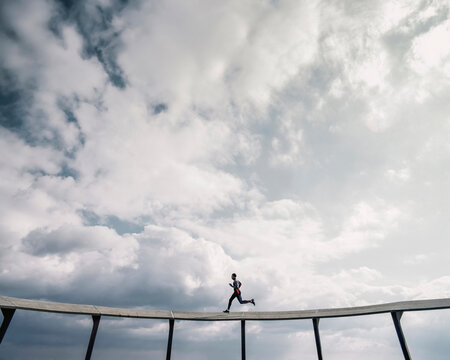 Male Athlete Training Outdoors on Track