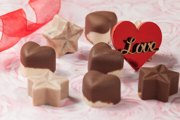 Present To Share; Tasty Chocolates With Star And Heart Shapes.