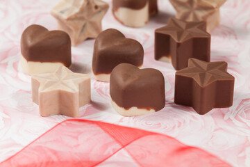 Present To Share; Tasty Chocolates With Star And Heart Shapes.