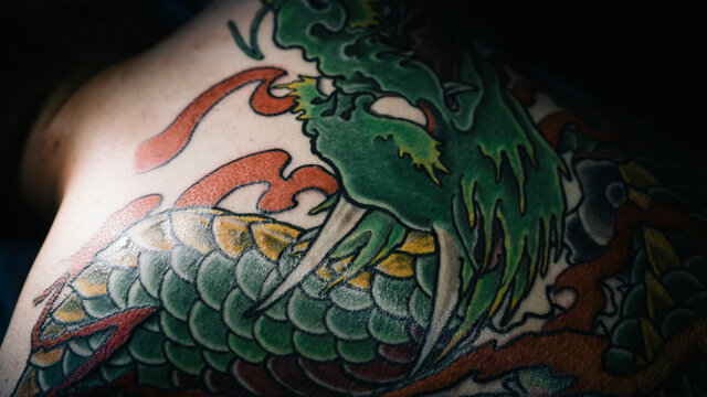 Detail of a traditionally tattooed Dragon