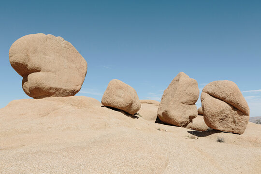 Row of monzogranite boulders in desert, Jumbo Rocks area