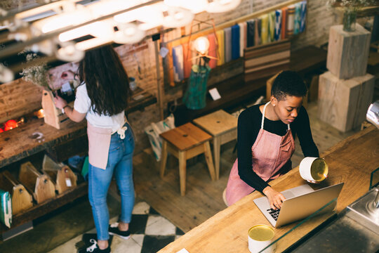 Female owners working in local store.