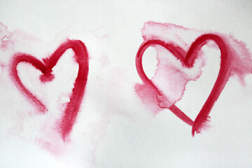 Two Pink Watercolor Hearts On White Paper