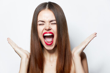 Woman with bare shoulders Aggressive mouth wide open spa treatments
