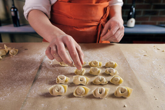Person cooking the dumplings