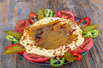 Classic hummus with parsley on the plate and pita bread. Hummus Chickpea. Bowl of arabic or...