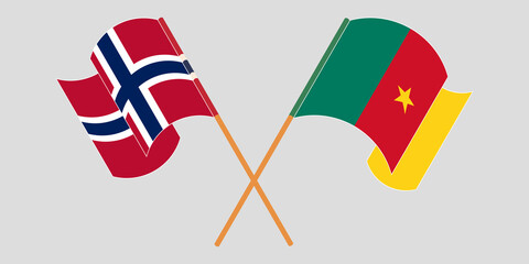 Crossed and waving flags of Cameroon and Norway