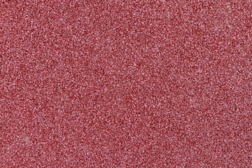 Soft red rubber coating . Rubber crumb coating for safe sports activities on the Playground.