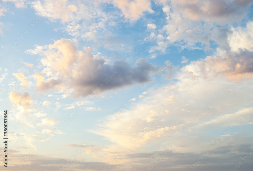 Wall mural beautiful view of the morning white clouds in the blue sky. peach beige color clouds. homosphere. su