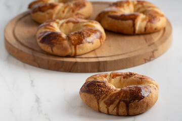 Acma with sesame seeds. Traditional Turkish pastry bread buns bagels.