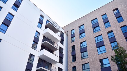 Multistoried modern, new and stylish living block of flats. Newly built apartment building.