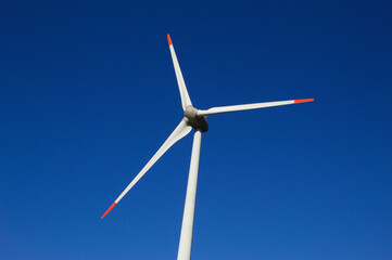 Wind generator with blue sky in the background