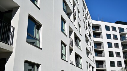 Multistoried modern, new and stylish living block of flats. Newly built apartment building.