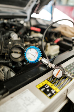 Measuring tool in a auto garage repair shop