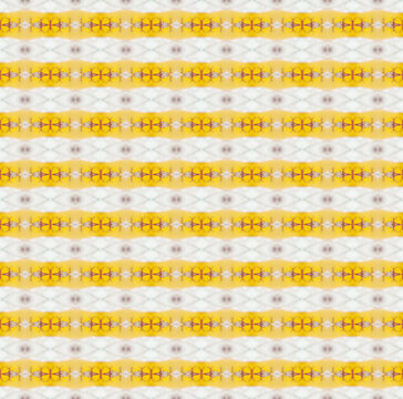 Yellow pattern repetition inside ancient kaleidoscope