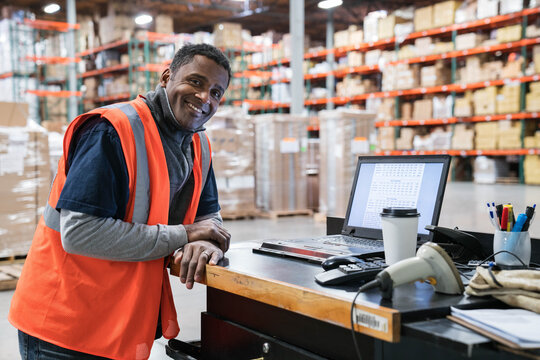 Portrait of single worker in distribution warehouse