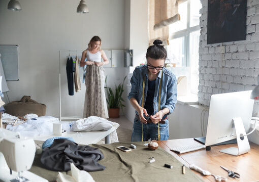 Woman in dressmaker shop