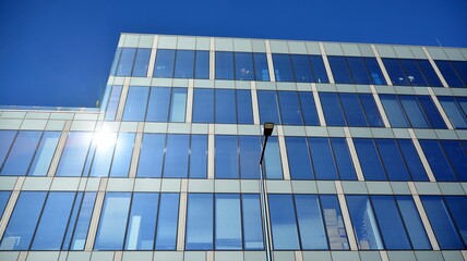 Modern building facade with reflections and colours.