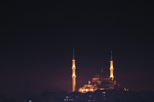 illuminated sehzade mosque at night, istanbul, Turkey