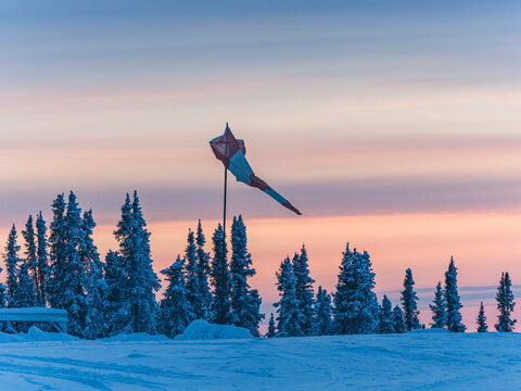 wintry twilight landscape scenery with carp flag floating on eagle plains,Yukon,Canada