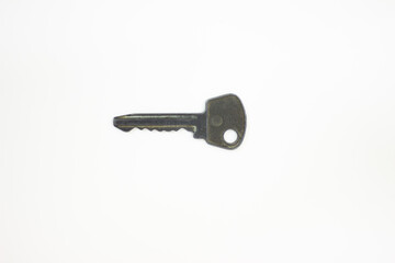 Ancient keys, used for long time. Vintage key on white background. Old key isolated. Keys on table. 