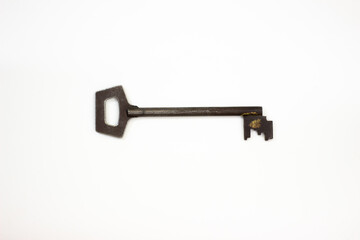 Ancient keys, used for long time. Vintage key on white background. Old key isolated. Keys on table. 