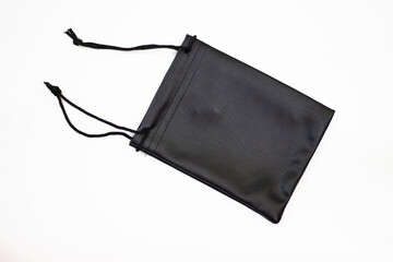 Black case. Small black pouch. Small bag. Clutch with black laces. Pouch and laces.